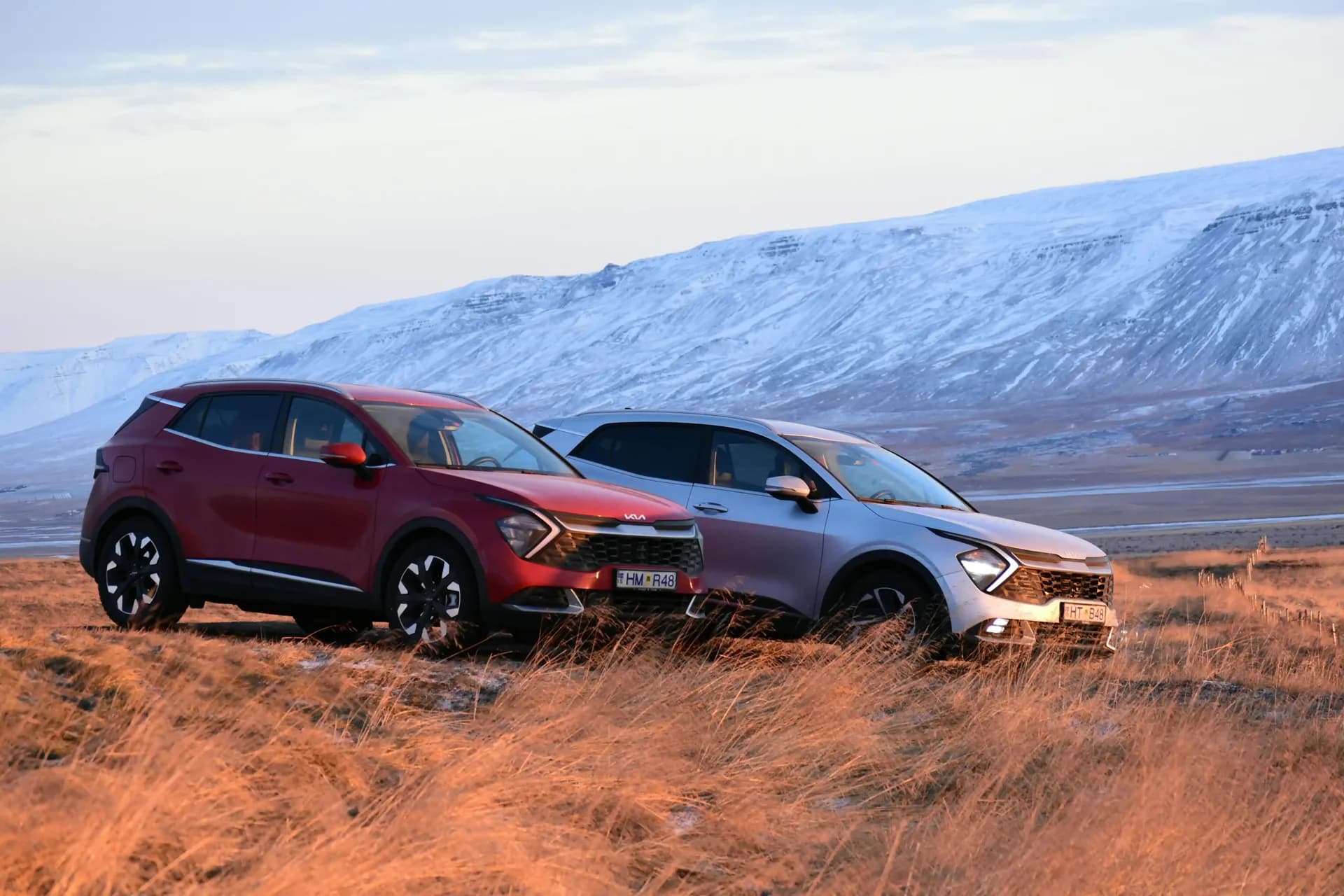 Cars driving through Iceland landscape
